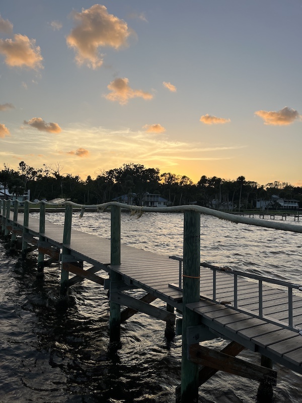 Sunset over the dock at the Airbnb across from NASA on the space coast