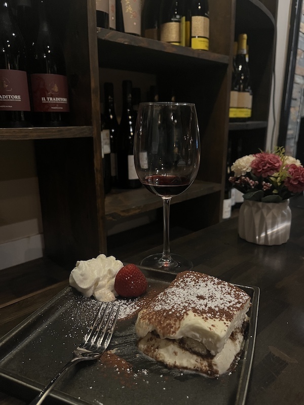 Tiramisu at an Italian restaurant in Orlando with red wine