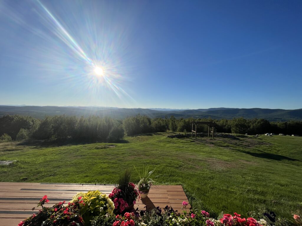 Alt text: mountaintop Airbnb view solo trip to Maine