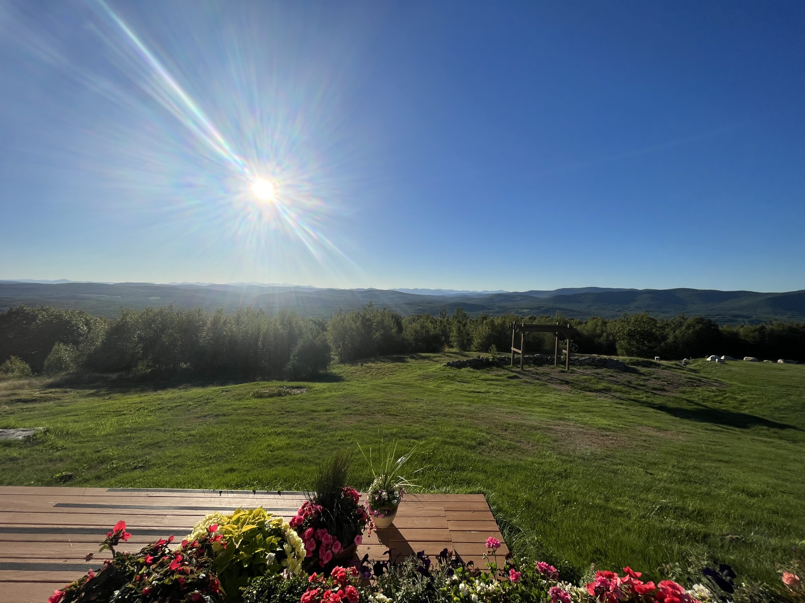 Alt text: mountaintop Airbnb view solo trip to Maine