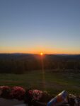 sunset from mountain porch burning yellow to deep blue solo trip Maine